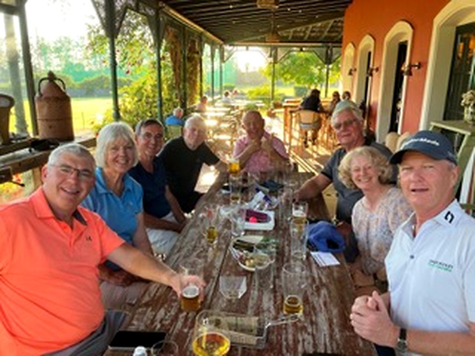 Hosted dinner around a long table